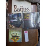 Four records Beatles Greatest Hits, Magical Mystery Tour, David Bowie picture disc, and Don't be