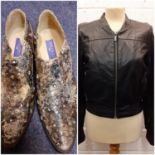Jimmy Choo for H&M- A ladies black leather bomber style jacket having a knitted black woollen