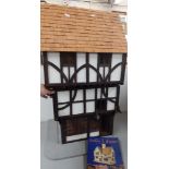 A handmade Tudor dolls house together with a Brian Long book on dolls houses Location: