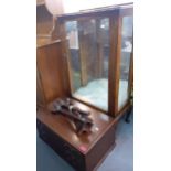 A 1940's walnut display cabinet together with a three drawer mahogany cutlery table Location:
