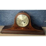 An Edwardian inlaid mahogany mantel clock with gong strike movement Location: