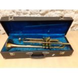 A gold tone Melody Maker trumpet in fitted case. Location:RAF