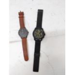 Two gents quartz wristwatches, a Ferrari Scuberia Formula chronograph on a metal strap and a Uniform
