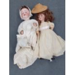A quantity of collectors dolls to include an Armand Marseilles bisque faced doll and a Simon
