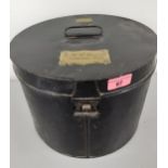 A Victorian Hamburger Rogers & Co black metal hat box with inscribed brass plaque to lid CHR