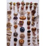A quantity of vintage brooches to include a 1970 Risis gold plated Kagawara Firebird orchid