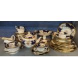 A late 19th/early 20th century Coalport tea set, numbered z.1002 to include bowls, cups, saucers,