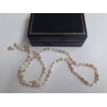 A 9ct gold with pink and white seed pearl necklace. Location:Cab