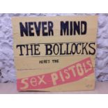 The Sex Pistols-An urban art on wooden panel 'Never Mind The Bollocks', signed by the artist