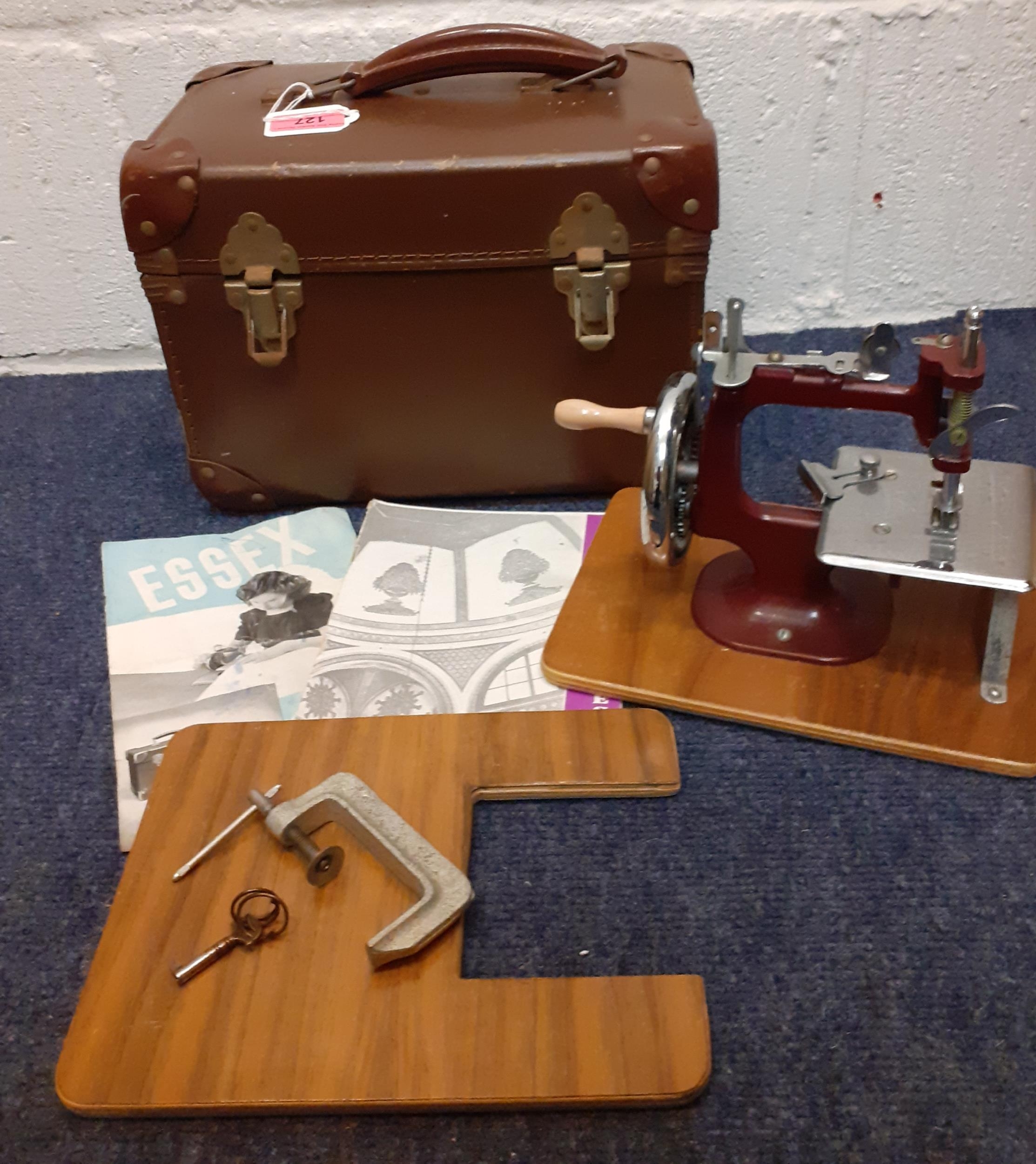 An Essex Miniature sewing machine with instruction manual and original hard case. Location:BWR - Image 3 of 8