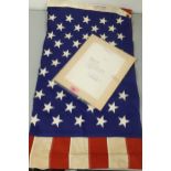 A vintage cloth American flag with certification that it has flown over the Union States Capitol