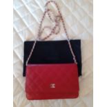Chanel-A small red 'Caviar' lambskin wallet on chain/small cross-over single flap shoulder bag