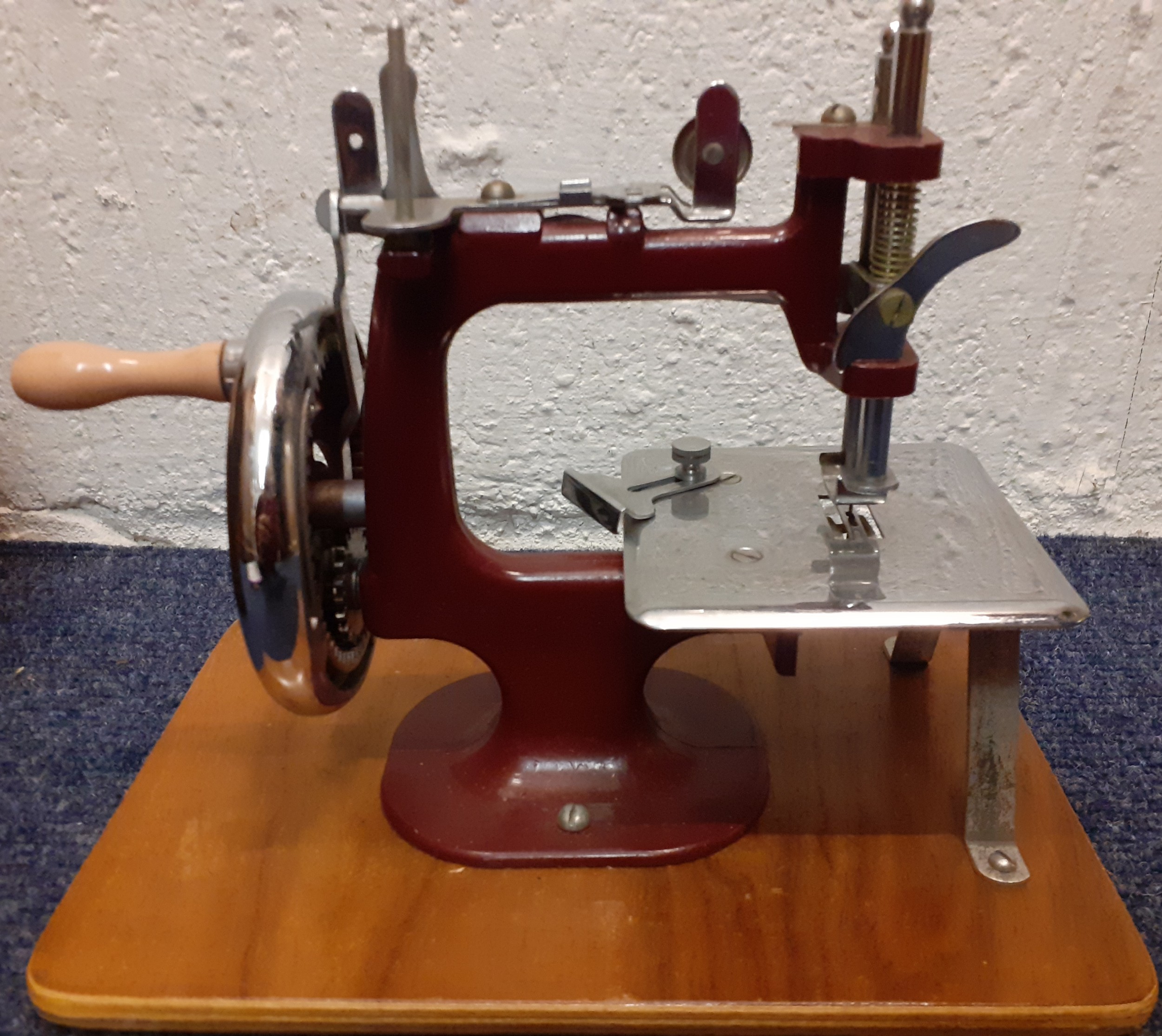 An Essex Miniature sewing machine with instruction manual and original hard case. Location:BWR