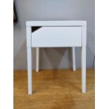 A modern white painted metal bedside table with a drawer Location: G