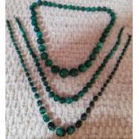 Two vintage malachite necklaces together with a vintage malachite effect example. Location:BWR