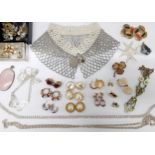 A quantity of costume jewellery to include 1980's clip on earrings and Ciro faux pearls and a