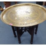 An Easter brass tray top folding table Location: A3B