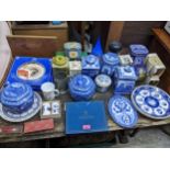 A collection of Maling Ware Ringtons blue and white tea canisters, and other tea related items,