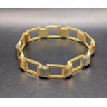 A yellow metal tank two tone bracelet, tested as gold total weight 17.8g Location: