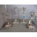 Pair of silver plated candlesticks and a pair of old Sheffield plated candlesticks. Location: