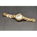 A Rotary 9ct gold cased ladies wristwatch on 9ct gold strap, 12.9g Location: