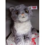 Steiff - a 2018 grey and white cat No 690211 with original tags intact and box, 21cm high