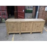 A Mongolian style sideboard with six doors, 91cm h x 222cm w Location: