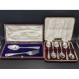 Silver to include a shell terminal fork and spoon and a set of six teaspoons, initialled, total