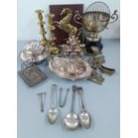 A quantity of silver plated items to include a muffin dish, a toast rack and a trophy on stand