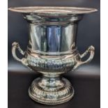 A silver plated wine cooler having a gadrooned rim and twin handles, marked 'hand chased Made in