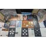 A group of eleven London Mint Office and other coin collection folders containing one coin, to