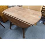 An Ercol Model 377 elm stained Gateleg dining table 71h x 113w. Location: