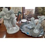 A plaster group of three ladies and a pair of kaiser porcelain figures and a silver plated tray