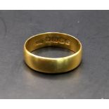 A 22ct gold wedding band, total weight 3.6g Location: