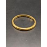 A 22ct gold wedding band, total weight 2.7g location:
