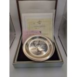 A solid sterling silver collectors plate limited edition, etched by the Franklin mint, with a