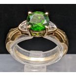 A 9ct gold Russian Diopside and diamond set ring 2.2g Location:RING