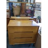 A retro Stag 'C' range oak dressing chest of three drawers with mirror above, designed by John &