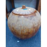 A large brown glazed pot with lid, 42cm high Location: RAB