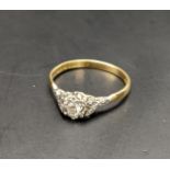 An 18ct gold and platinum diamond ring, total weight 2.3g Location: