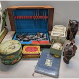 A mixed lot to include a canteen of cutlery, The World of Peter Rabbit by Beatrix Potter, the
