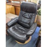 A Stressless leather upholstered swivel and reclining armchair Location:
