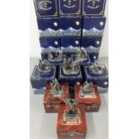 A quantity of 20 boxed Tudor Mint Myth & Magic pewter mystical models with crystal additions