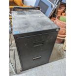 A black finished metal two drawer filing cabinet Location: