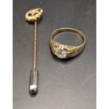 A 9ct gold and paste stone ring, together with a yellow metal stick pin tested as 9ct, total