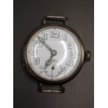 A silver cased gents Trench watch having Arabic numerals and luminous hands Location: