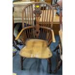 A Stewart Linford limited edition Millennium Windsor spindle back armchair having a crinoline