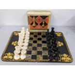 A boxed Chad Valley chess set, together with a lacquered, folding and mother of pearl inlaid