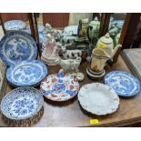 A selection of ceramics to include 19th century blue and white plates, 18th/19th century saltglaze