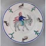 An Italian D'Amico Vietri hand painted wall hanging charger, depicting man on hose back Location: